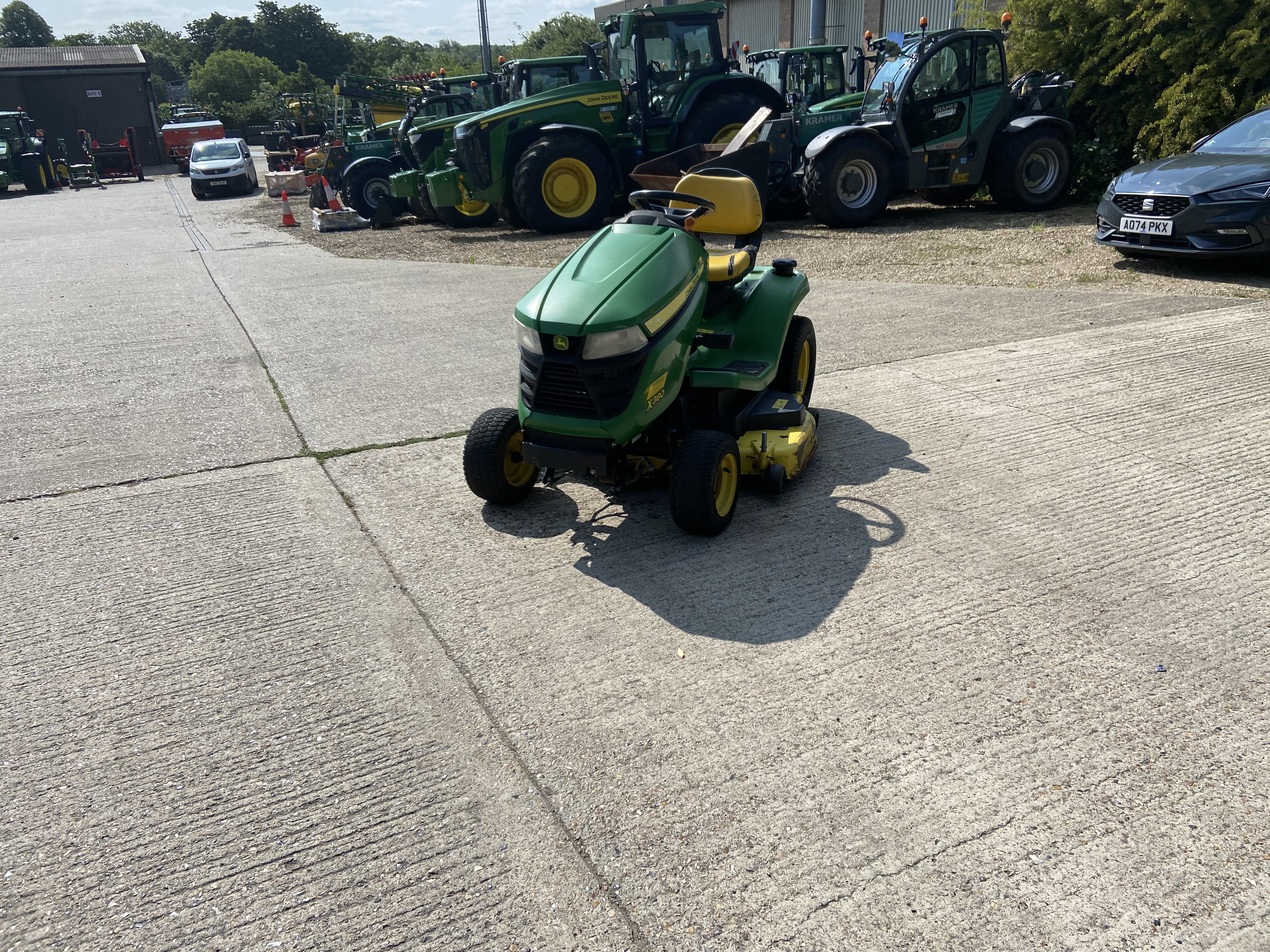 John Deere X380 48″